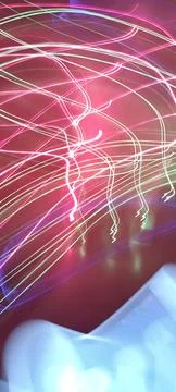 Simulation of galaxy light motion of stars in dark background, future energy 写真素材