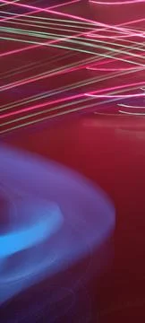 Simulation of galaxy light motion of stars in dark background, future energy 写真素材