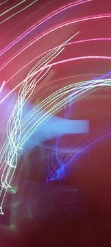 Simulation of galaxy light motion of stars in dark background, future energy 写真素材