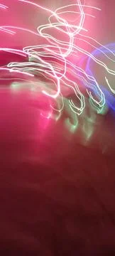 Simulation of galaxy light motion of stars in dark background, future energy Stockfoto's