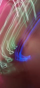 Simulation of galaxy light motion of stars in dark background, future energy 写真素材