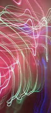 Simulation of galaxy light motion of stars in dark background, future energy Stockfoto's