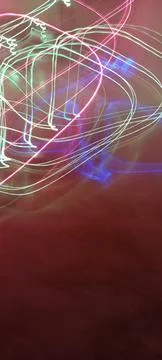 Simulation of galaxy light motion of stars in dark background, future energy 写真素材