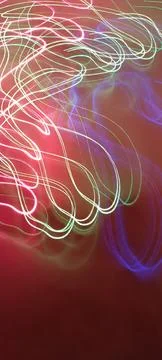 Simulation of galaxy light motion of stars in dark background, future energy Stockfoto's