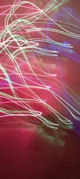 Simulation of galaxy light motion of stars in dark background, future energy Stockfoto's