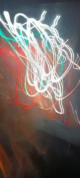 Simulation of galaxy light motion of stars in dark background, future energy Stockfoto's