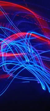Simulation of galaxy light motion of stars in dark background, future energy Stock Photos