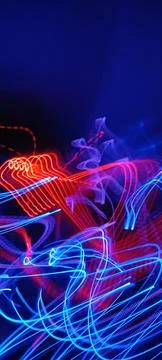 Simulation of galaxy light motion of stars in dark background, future energy Stock Photos