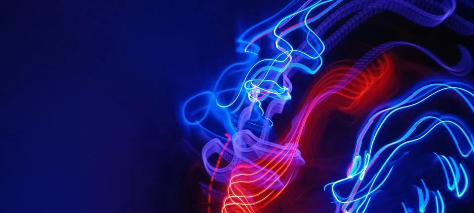 Simulation of galaxy light motion of stars in dark background, future energy Stock Photos