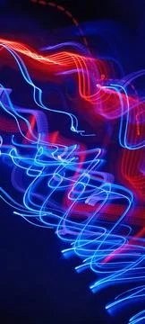 Simulation of galaxy light motion of stars in dark background, future energy Stock Photos