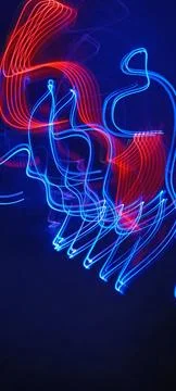 Simulation of galaxy light motion of stars in dark background, future energy 스톡 사진