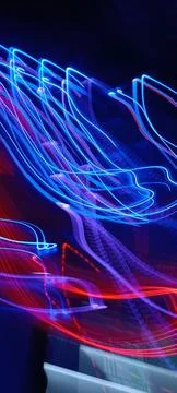 Simulation of galaxy light motion of stars in dark background, future energy 스톡 사진