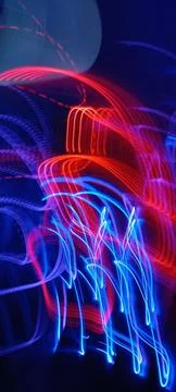 Simulation of galaxy light motion of stars in dark background, future energy 写真素材