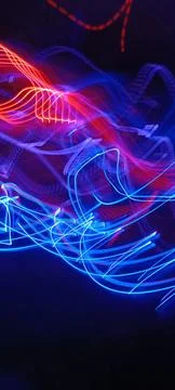 Simulation of galaxy light motion of stars in dark background, future energy Stock Photos