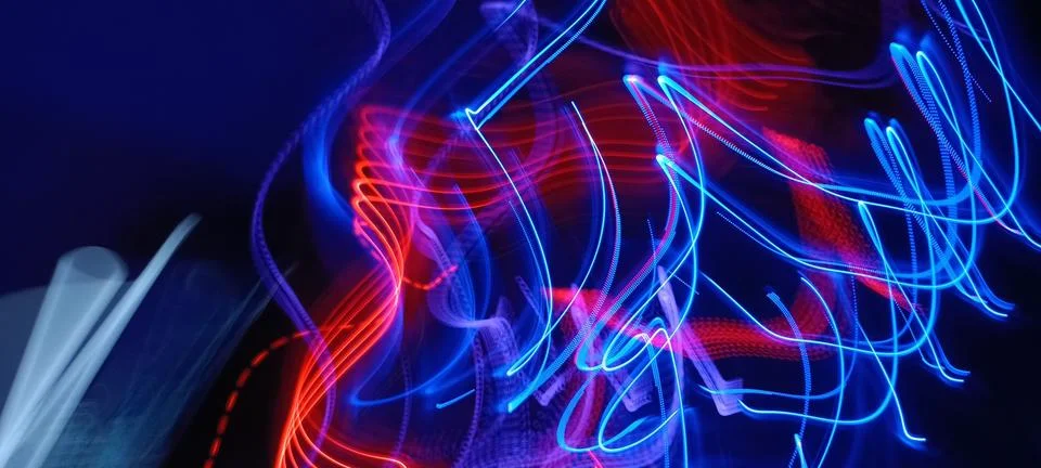 Simulation of galaxy light motion of stars in dark background, future energy Stock Photos