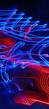 Simulation of galaxy light motion of stars in dark background, future energy 스톡 사진