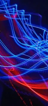 Simulation of galaxy light motion of stars in dark background, future energy 스톡 사진