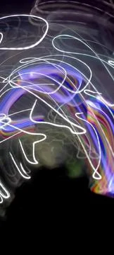 Simulation of galaxy light motion of stars in dark background, future energy Stock Photos