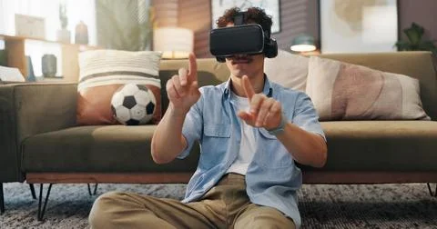 Simulation, gamer and man with vr headset, home and 3D virtual reality with tech Stock Photos