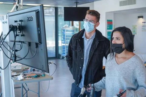  Simulation on Lap Sim Internal students in digestive surgery train on a L... Stock Photos