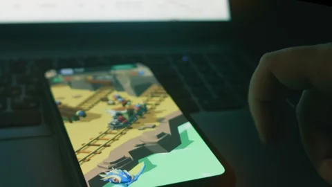 Simulation for mining game on mobile phone. Hologram effect. 스톡 동영상 250069533