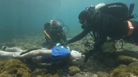 Simulation of underwater crime detection on the back of the dummy,Ustica,Med sea Video stock 124386909
