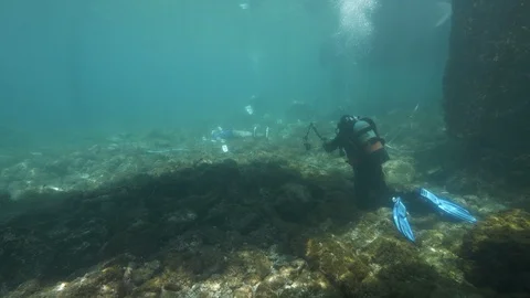 Simulation of an underwater crime scene, divers making detections,Ustica,Med sea Stock Footage 124263608