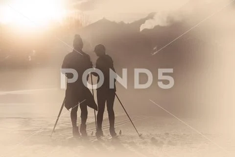 Simulations of old photography with artifacts. Cross-country skiing couple Stock Photos
