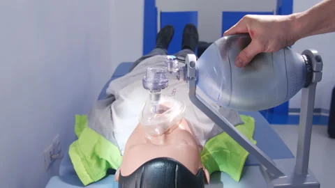 Simulator of using medical ventilator on human body model in educational center Stock Footage 233267214
