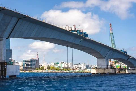 Sinamale Bridge under construction across the ocean in Male Maldives Stock Photos