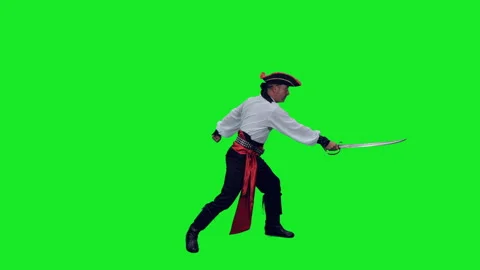 Сinematic style of rugged pirate fighting with sword on green background Stock Footage 304294545