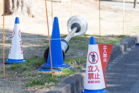 Sing of do not enter in front of collapsed street light Stock Photos