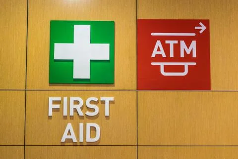 Sing for first aid box and ATM. Stock Photos