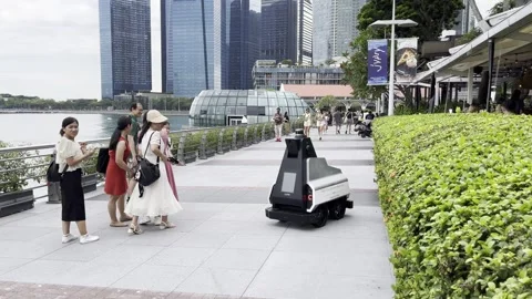 Singapore: AI-based autonomous security ground patrol robot in Marina Bay, 4K Stock Footage 291296157