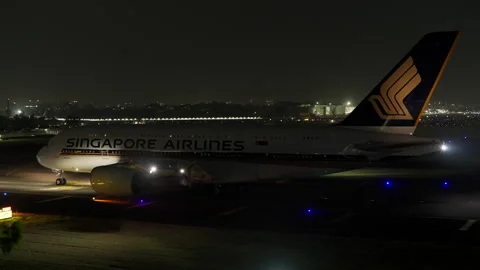 Singapore Airlines Airbus A380 Passenger Airplane Taxi, Takeoff, Mumbai at Night Stock Footage 253577882