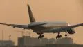 Singapore Airlines landing at sunrise HD Footage