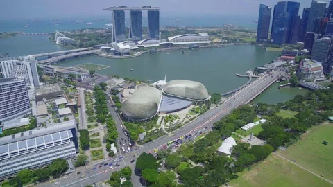 SINGAPORE - CIRCA APRIL 2015: City skyline, Marina Bay and Raffles Place, view Stock Footage