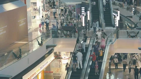 Singapore - circa dec 2013: interior of a modern store with escalators Stock Footage 40666322