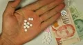 Singapore Dollar SGD, Counting Drugs and Money, Health Care, Colorful Pills HD Footage