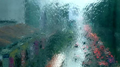 Singapore - Elevated view of traffic viewed through window on rainy day Stock Footage 90406659