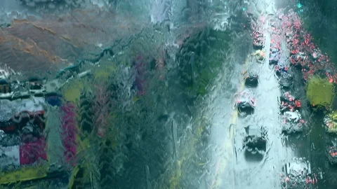 Singapore - Elevated view of traffic viewed through window on rainy day Stock Footage 90406850