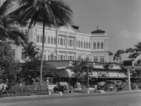 Singapore: Exterior Shot of Colonial-Era Raffles Hotel  1930s Stock Footage