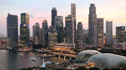 Singapore Financial District Skyline with Modern Skyscrapers at twilight, Asia Stock Footage