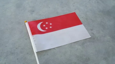 Singapore flag close up on isolated background. Concept Singaporean country Stock Footage 344084637
