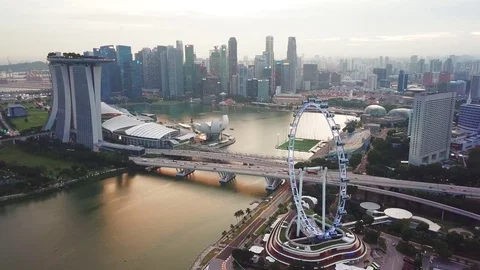 Singapore Flyer and the city skyline Stock Footage