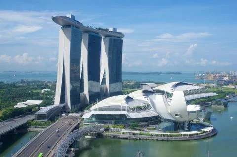 SINGAPORE - JULY 23rd, 2016: unique skyscraper in downtown Marina Bay with a Stock Photos