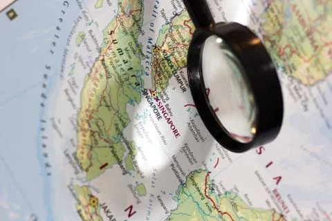 Singapore on the map of the world. Stock Photos