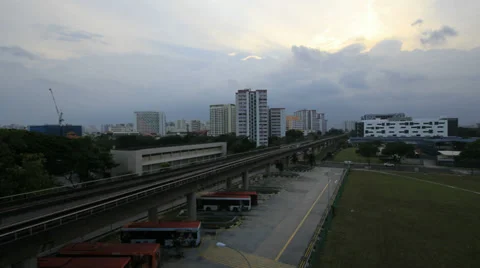 Singapore Mass Rapid Transit in Eunos District at Sunset with Clouds Timelapse Stock Footage 35284600