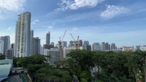 Singapore: Panoramic view of the city centre from the Shrangri-La Hotel, 4K Stock Footage 254344851
