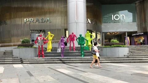 Singapore: People walk by the ION Stock Video Pond5